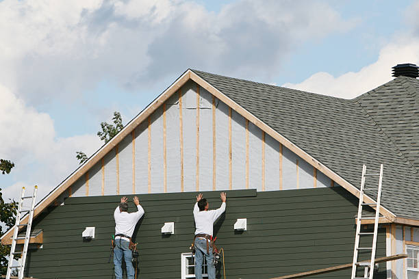Professional Emergency Siding Repair technician working in Berea, OH